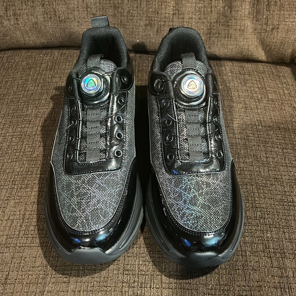Stylish Black and Patent Leather Trim Sneakers with unique twist knob laces. - Picture 3 of 9